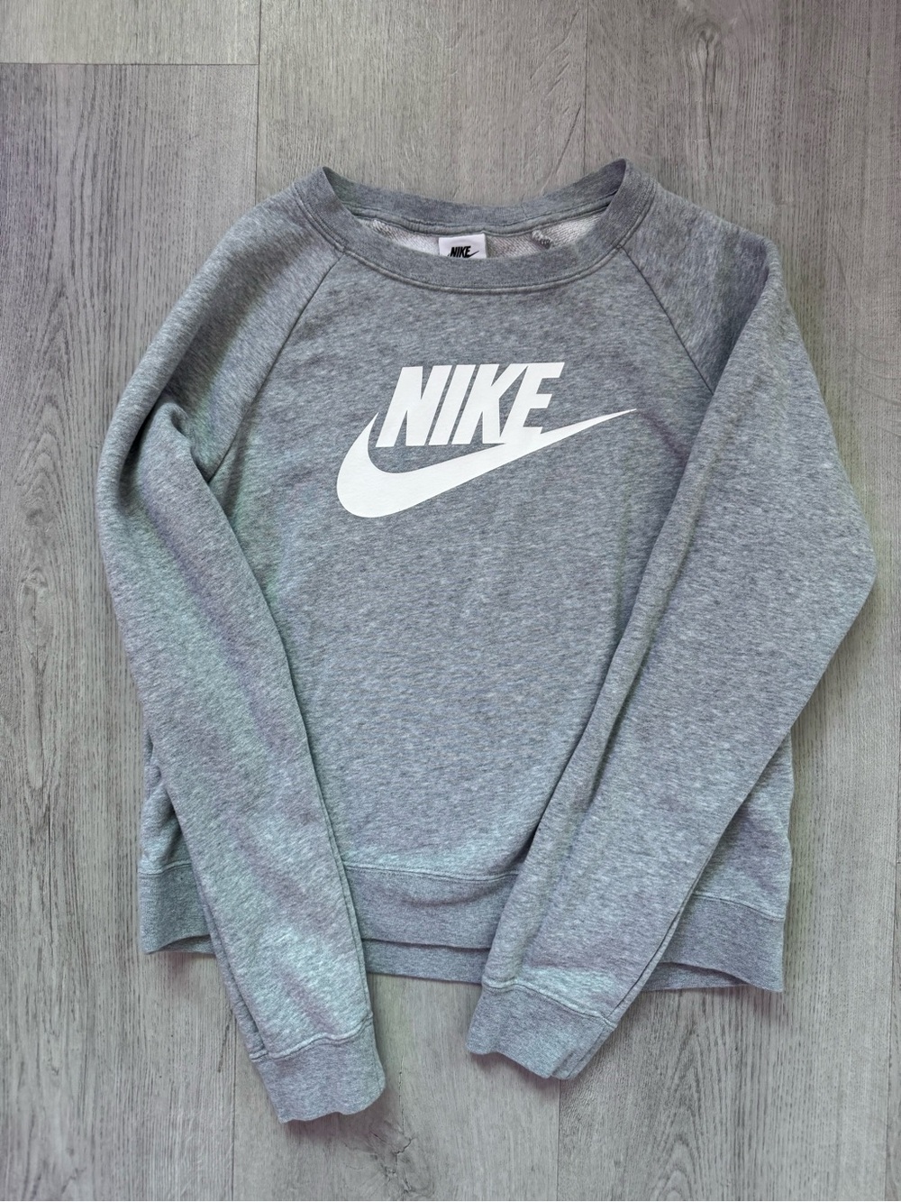 Nike Women's Heather Gray Crewneck Sweatshirt with White Logo